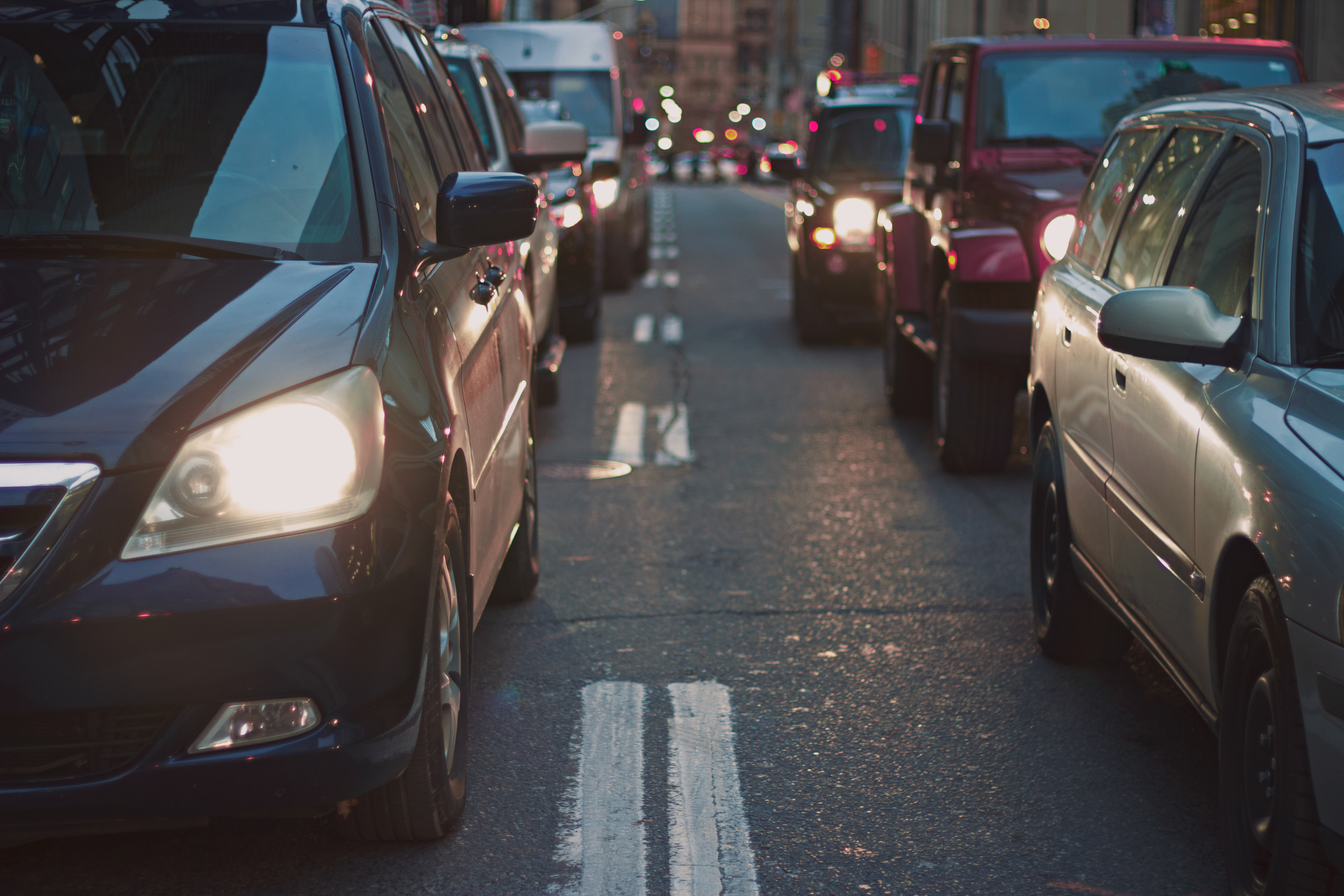 Cars sitting in traffic